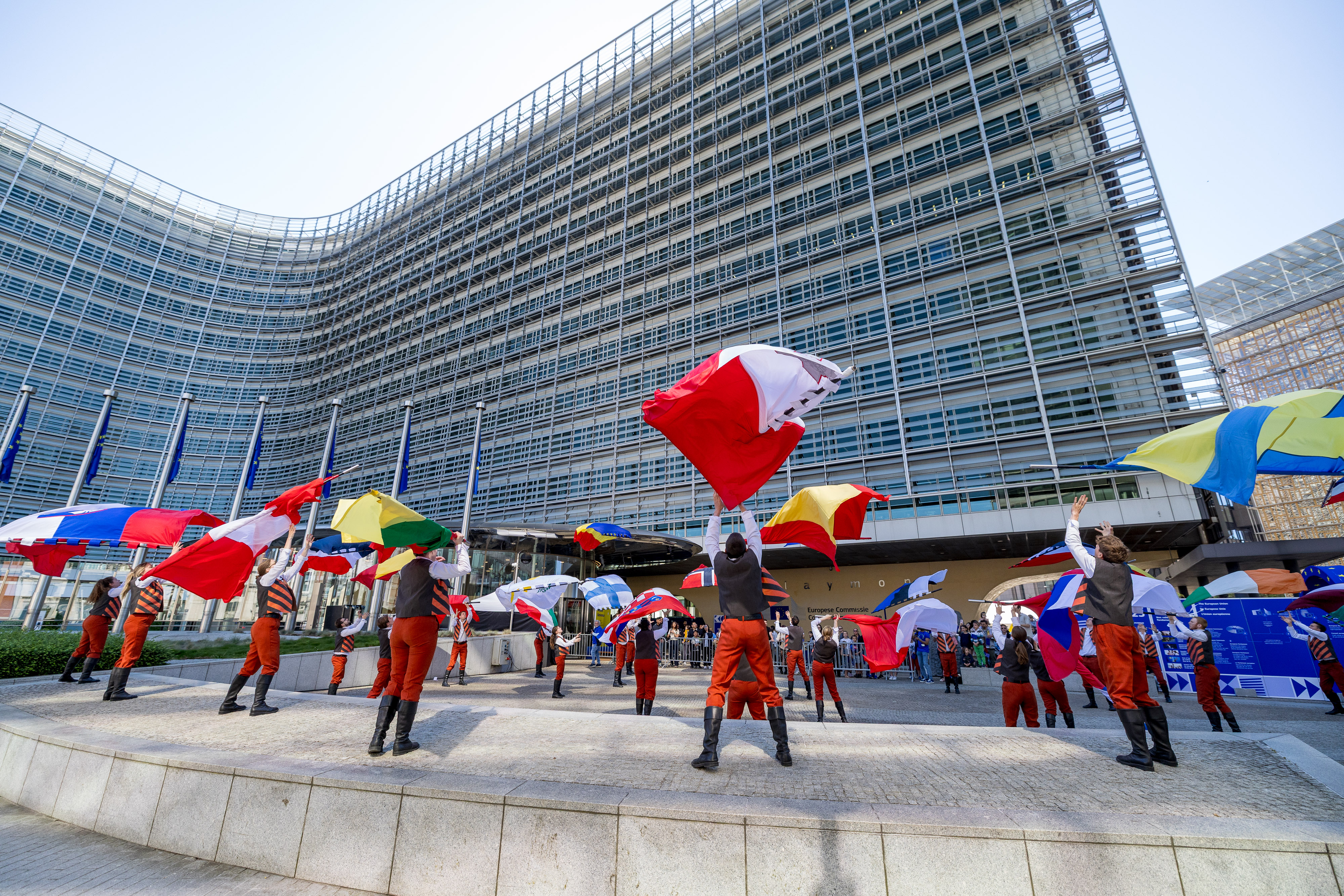 View of participants holding flags