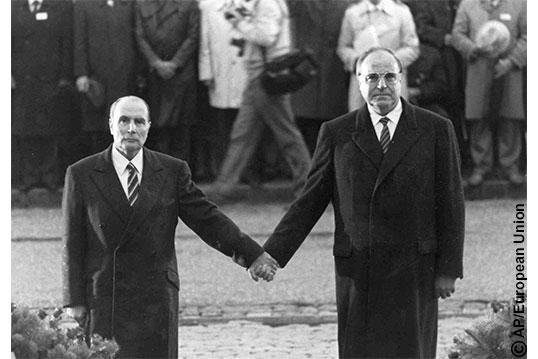 Helmut Kohl and François Mitterrand holding hands