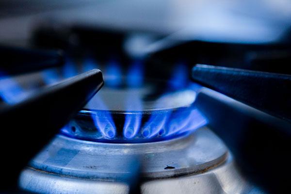 Blue flames on a gas stove