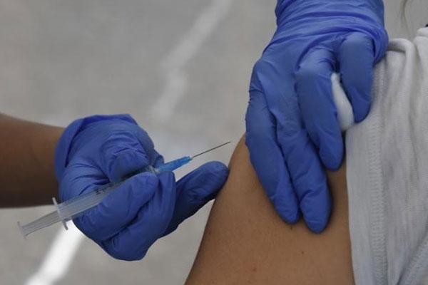 A person getting vaccinated against COVID-19