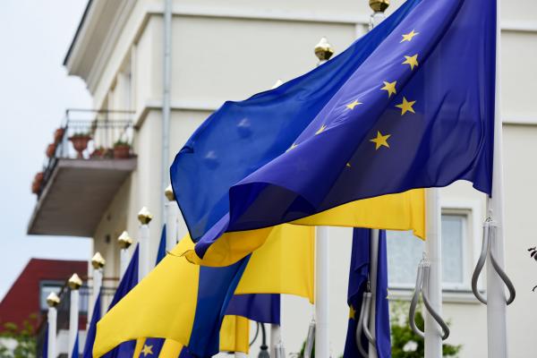 Ukrainian and European flags waving