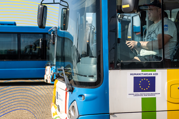 A driver moving a bus donated by Luxembourg