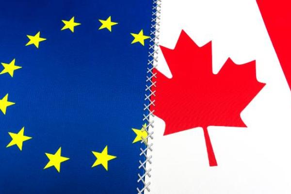 A seam binding the European and Canadian flags