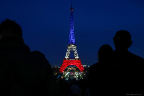 Eiffel Towers Turns Blue, White and Red, Colors Of the French Flag For The Victims Of November 13th 2015 Terrorist Attacks