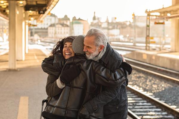 A family reuniting at train station