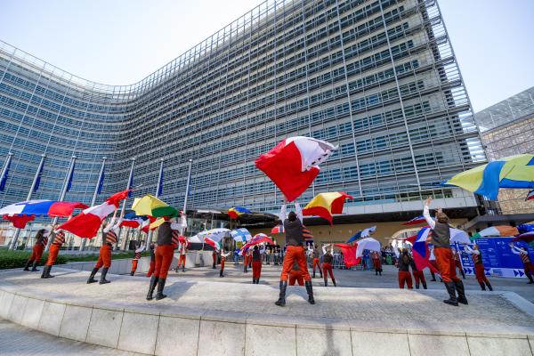 View of participants holding flags